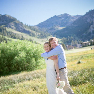 Mountain weddings photographer image in meadow