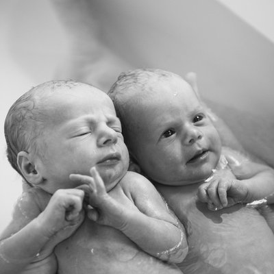 newborn twins in bath