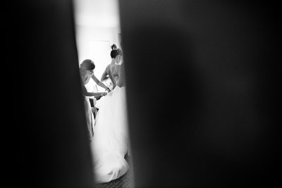 black white bride getting ready doorway sarasota wedding