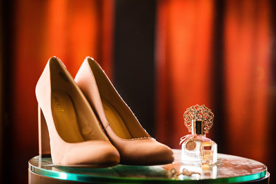 details shot bride's wedding shoes perfume tampa