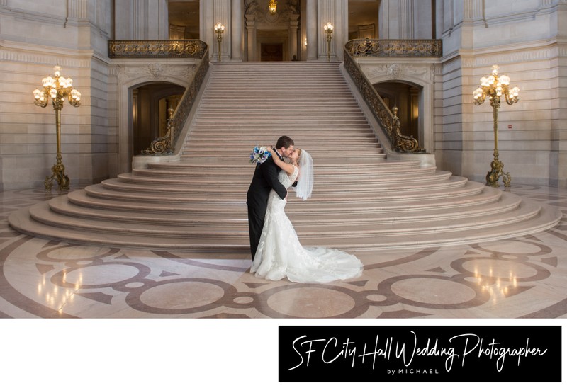 Grand Staircase Wedding Kiss at city hall