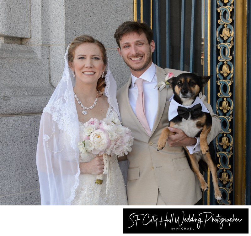 SF City Hall Bride and Groom with their dog out by the entrance