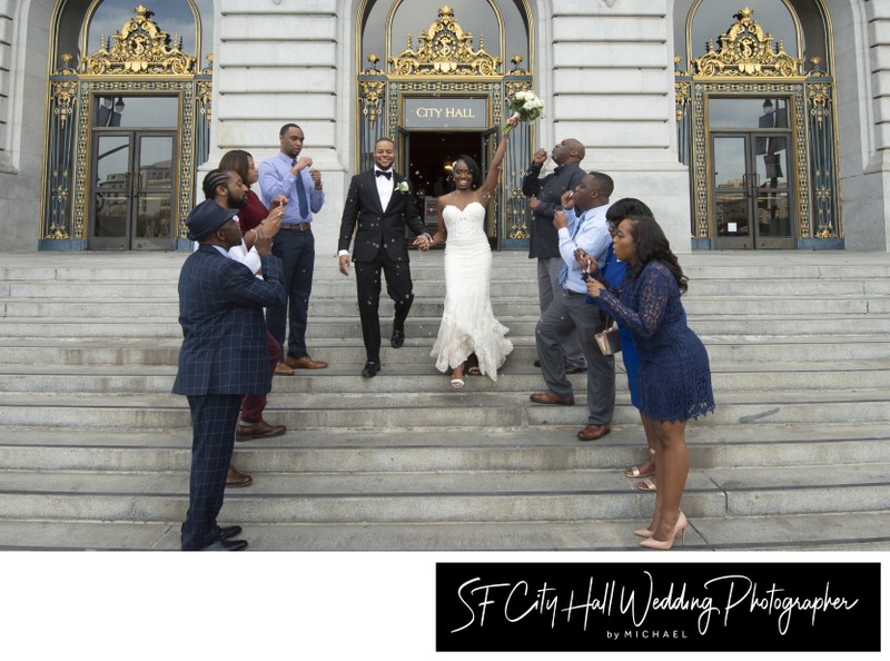 Bride and Groom leaving San Francisco city hall after nuptials
