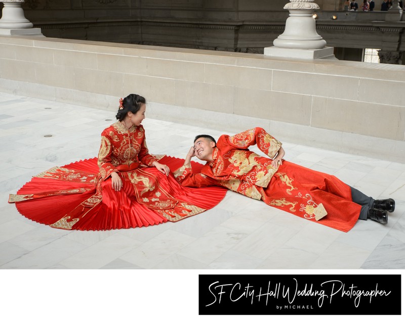 Asian couple wearing traditional dress for their city hall wedding