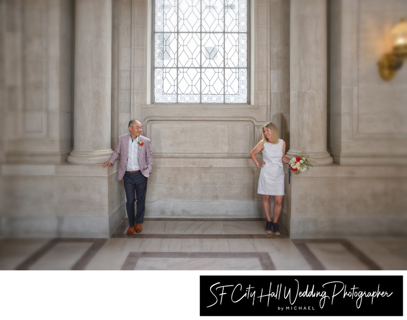 Bride and groom checking each other out at San Francisco city hall