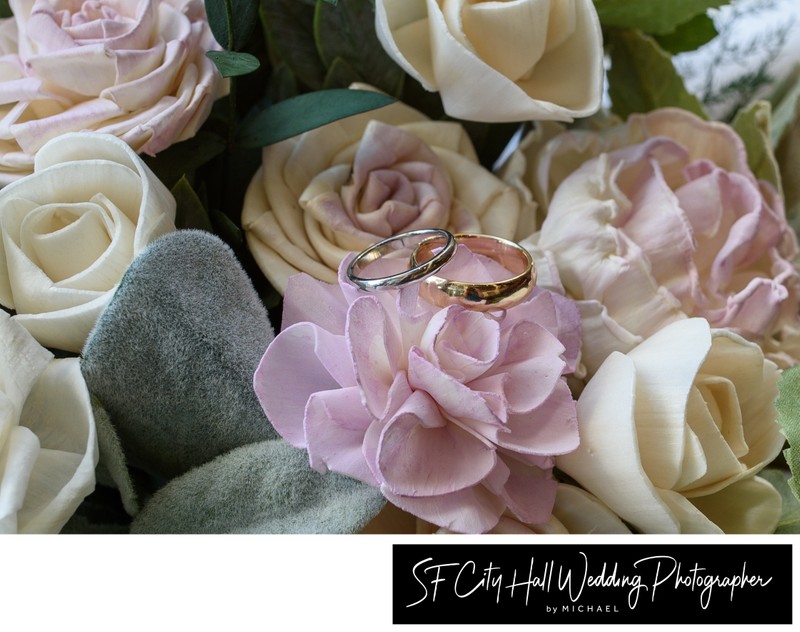 Close up wedding photography of flowers and ring