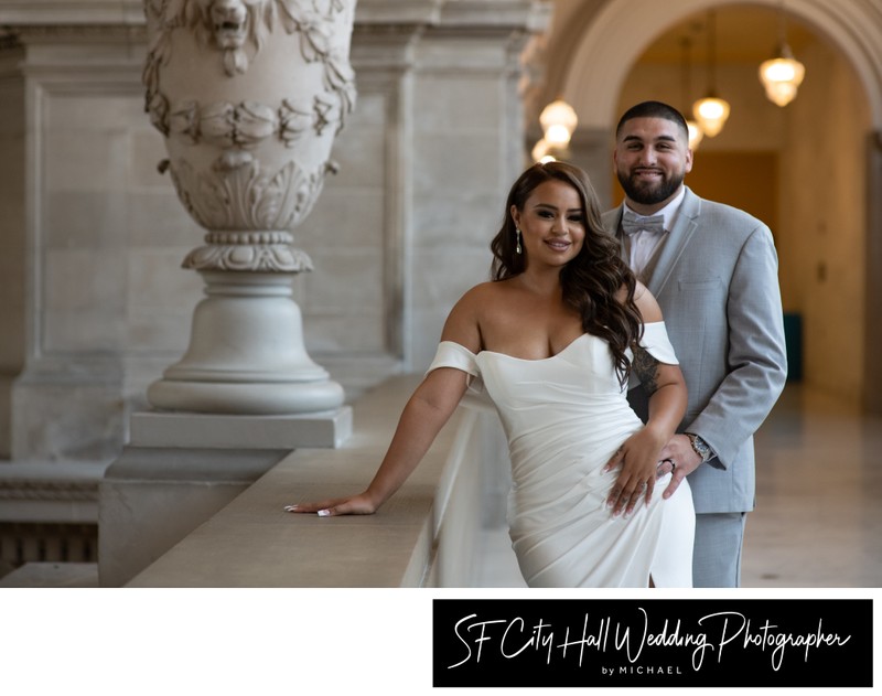 Newlyweds posing on the 4th Floor - Wedding Photographer San Francisco city hall 