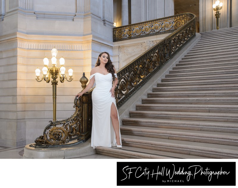 Pretty Bride posing for the camera on the Grand Staircase