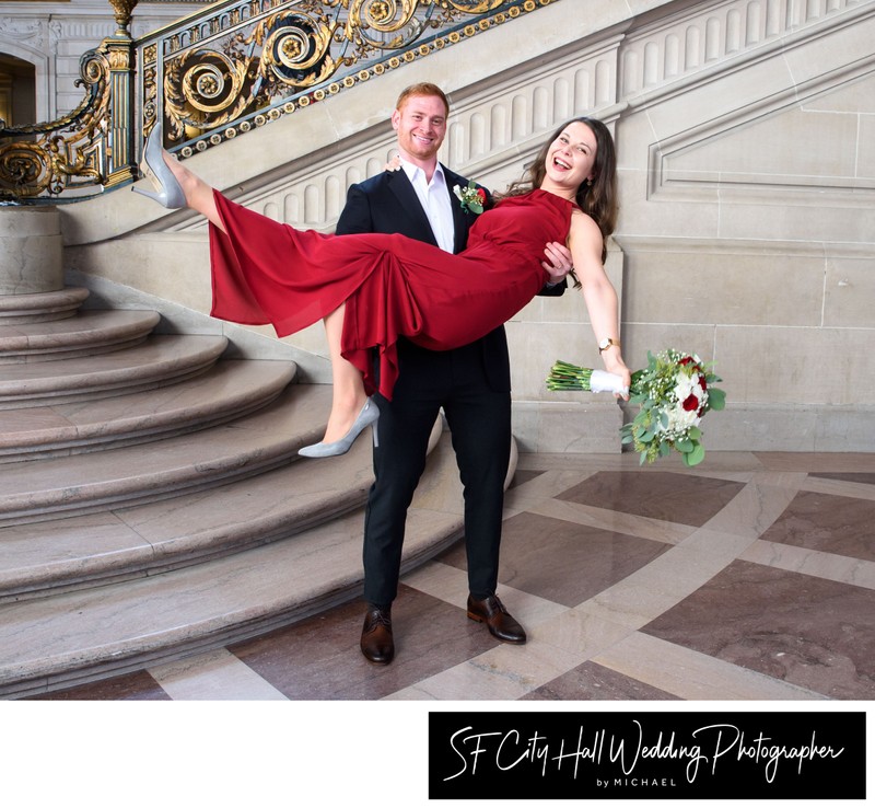 Happy Couple celebrating recent nuptials by the Grand Staircase