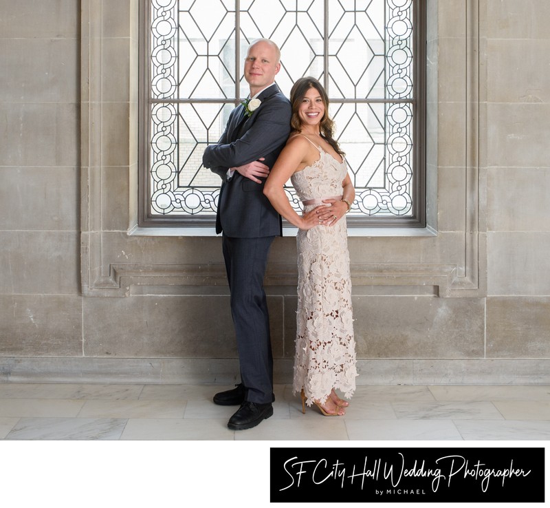 Bride and Groom back to back - San Francisco city hall wedding photographer