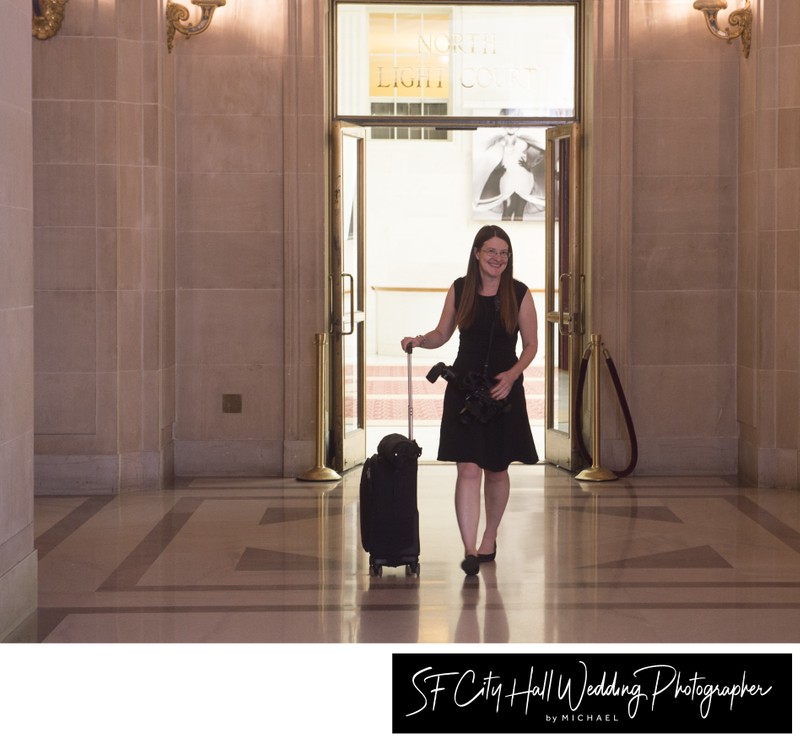 My shooting partner Toni Bailey walking with her camera equipment at city hall