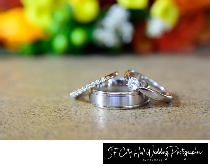 Detail Shot of Wedding rings on San Francisco city hall marble floor