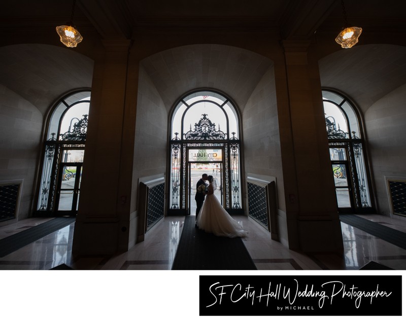 Triple entrance picture of Bride and Groom at San Francisco city hall