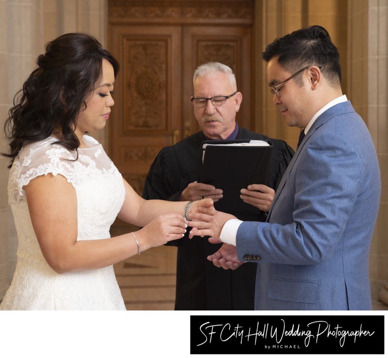 Wedding ceremony ring exchange with our favorite Marriage Commissioner