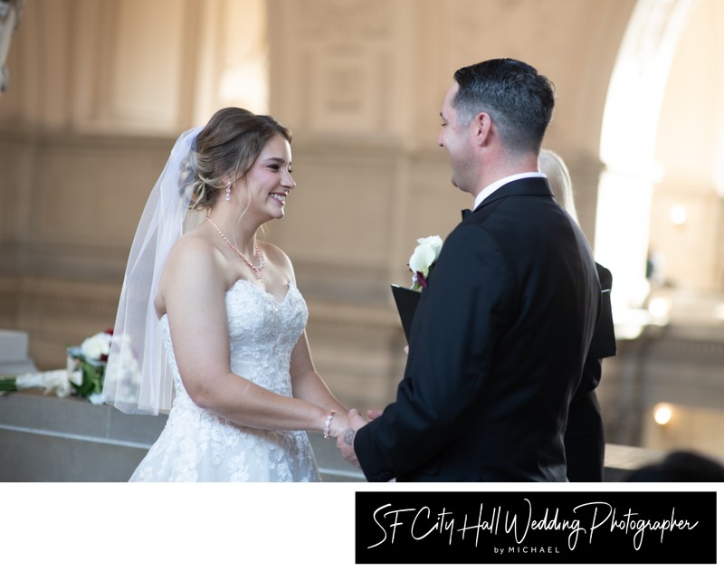 Bride and groom exchanging vows - wedding photography