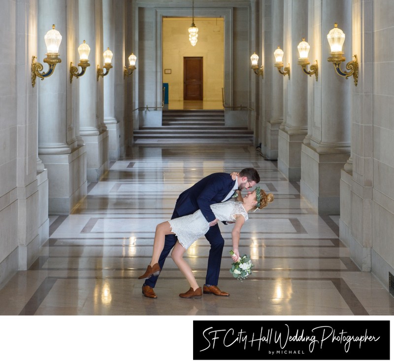 Deep dance dip in the hallway - wedding photography