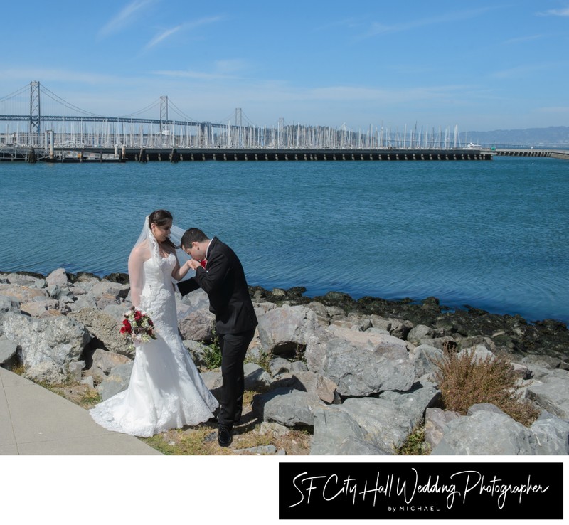 Bay Bridge View with bride and groom in San Francisco