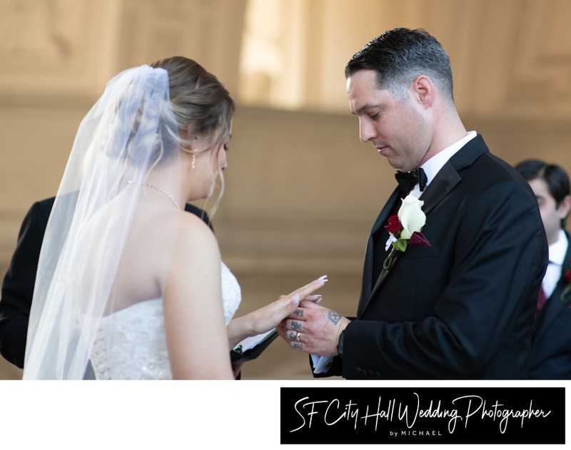 Wedding ring exchange during city hall nuptials