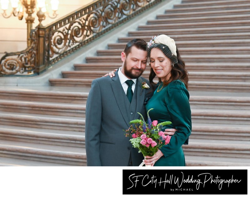 City Hall Bride and groom check out their bouquet