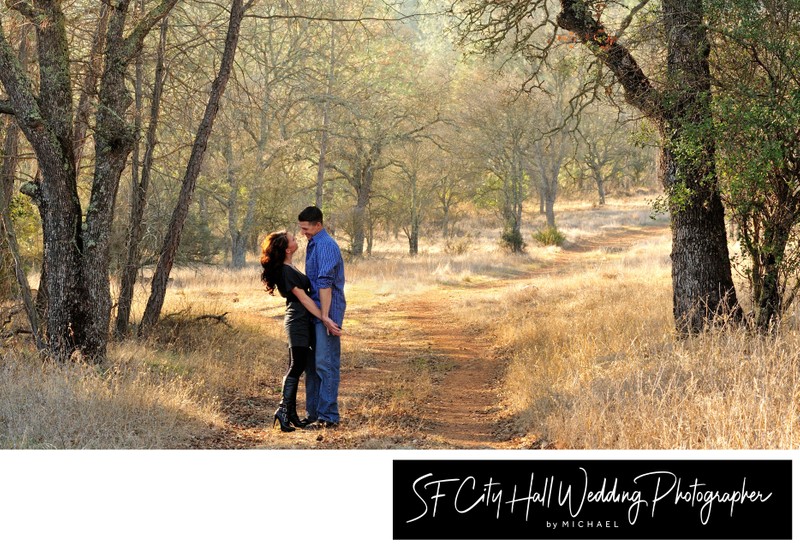 Engagement Portrait out by the trees and foliage 