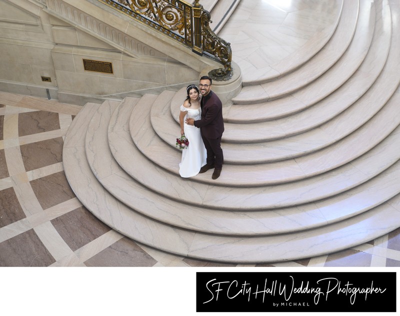 Grand Staircase from above at SF City Hall with Bride and Groom