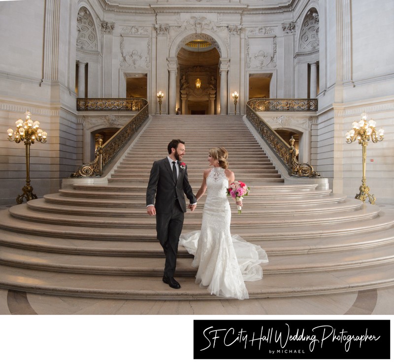 SF City Hall Bride and Groom walk down the Grand Staircase