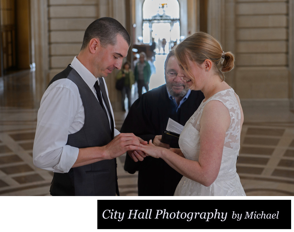 Ring exchange on the Grand Staircase wedding ceremony