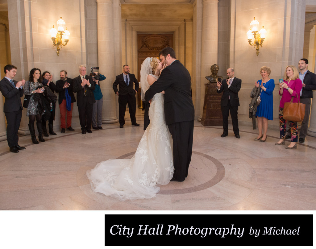 Nuptial Kiss City Hall Wedding Photographer's Image
