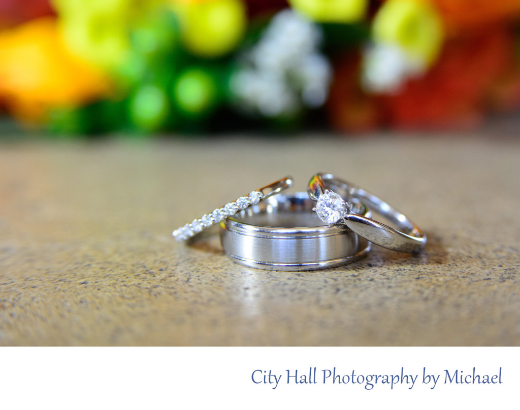wedding rings bouquet close up photographer