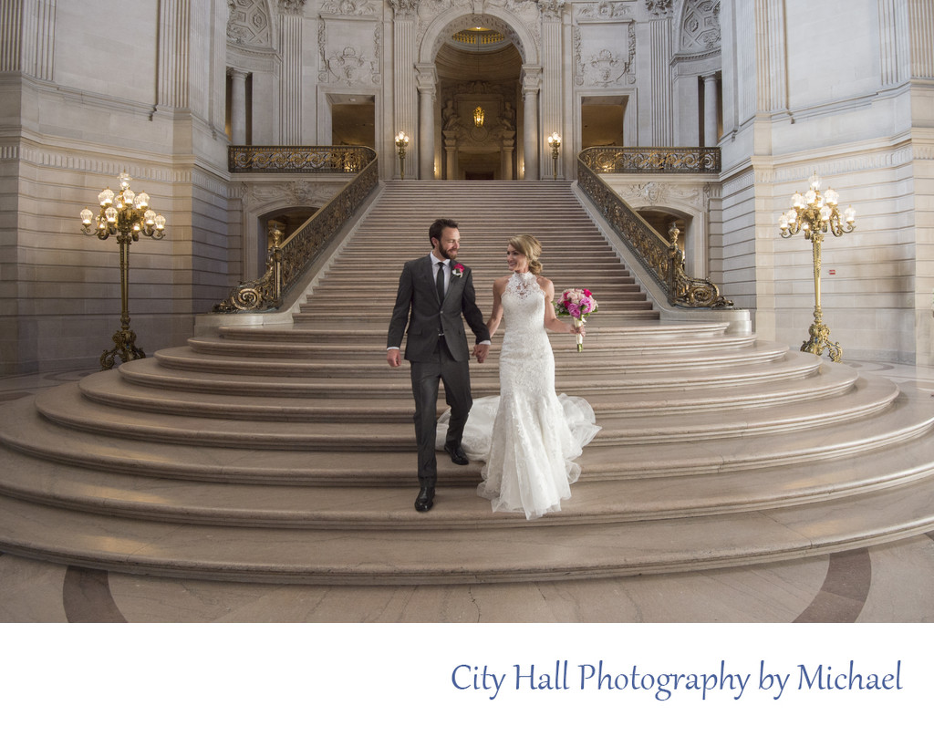 Bride and Groom walking down the Grand Staircase in SF