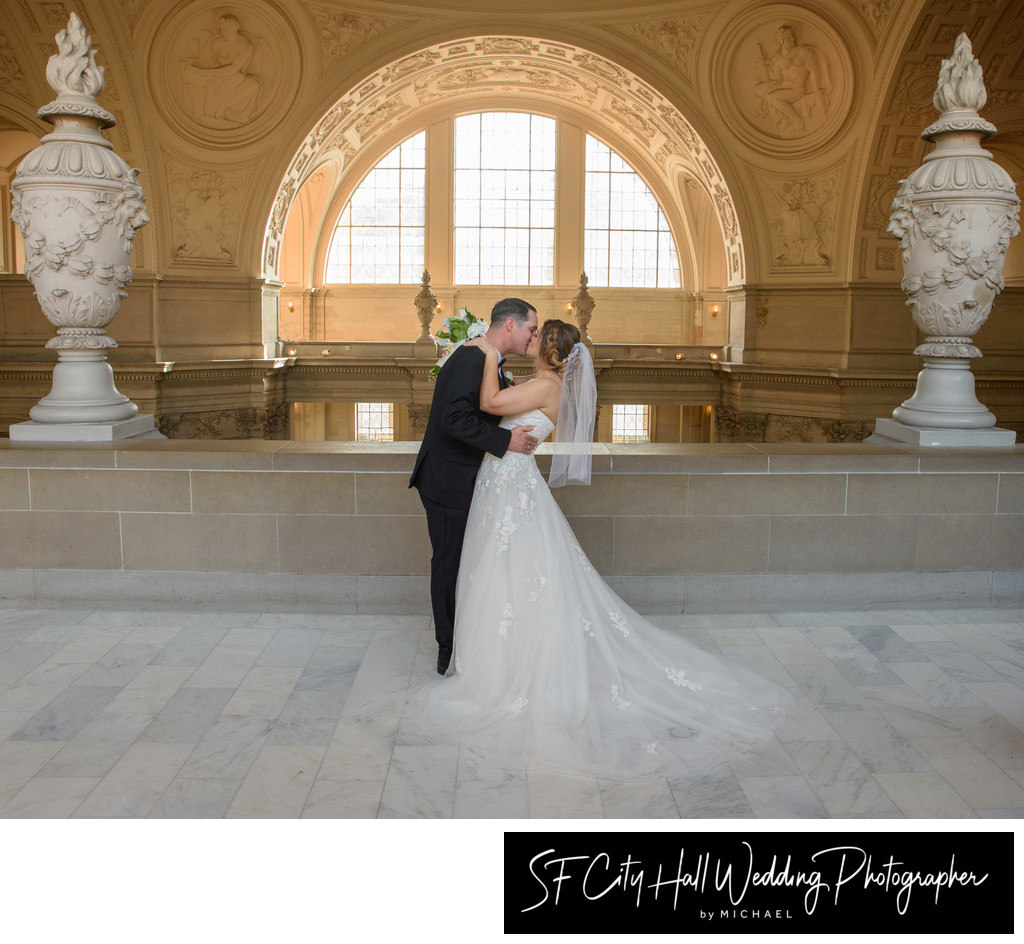 SF City Hall Bride and Groom Kiss on the 4th Floor North Gallery