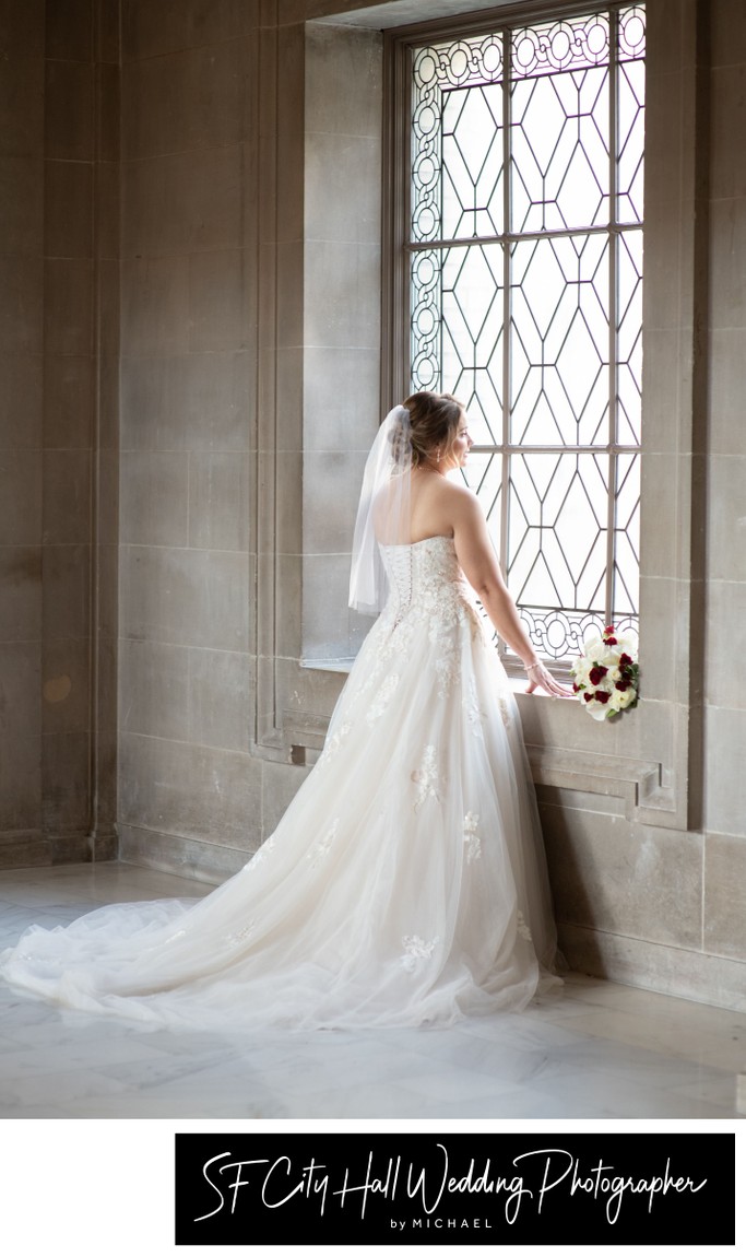 Bride's veil in San Francisco city hall window light