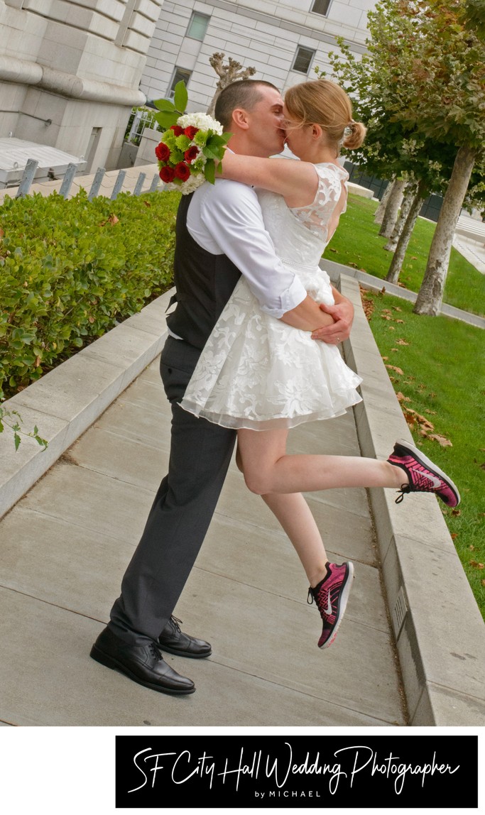 Bride using Red Tennis shoes for a fun prop at SF City Hall