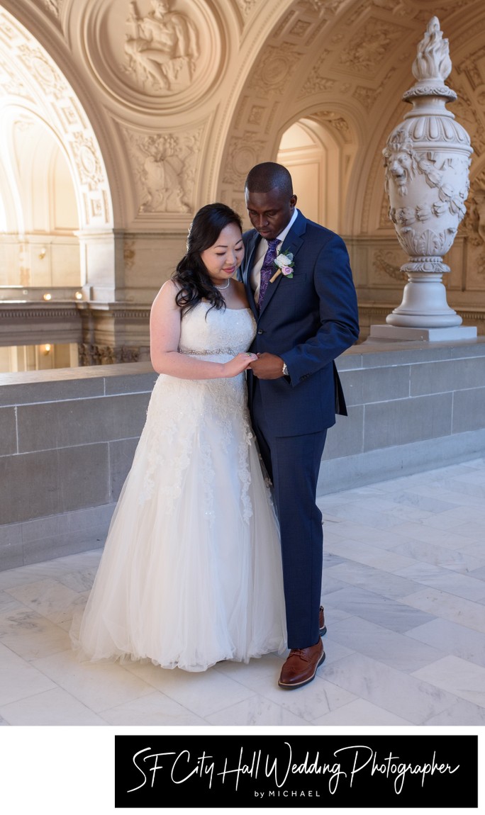 Black Groom with Asian bride at San Francisco city hall