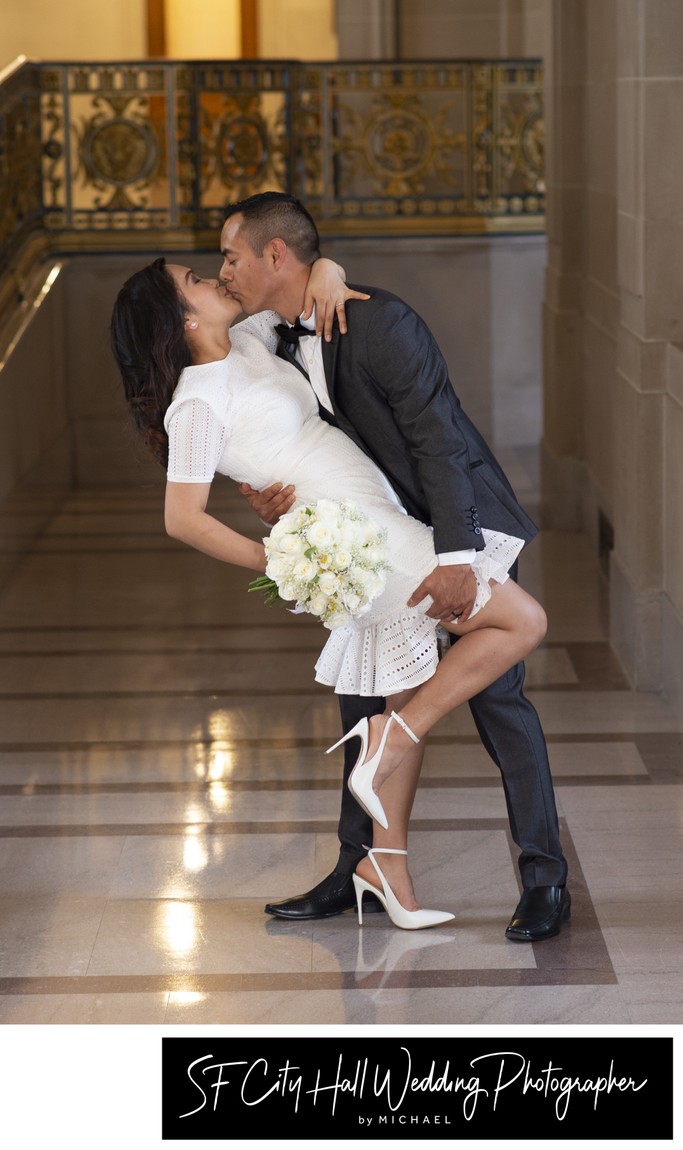 Romantic San Francisco couple dance dip for the wedding photographer