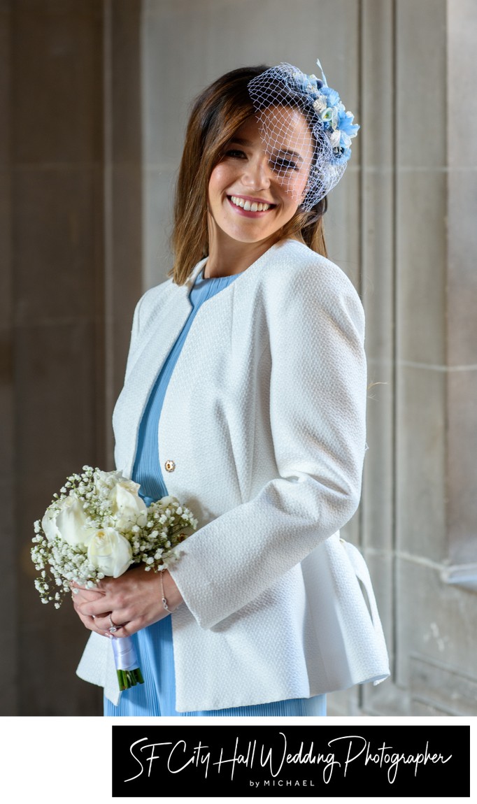 Gorgeous San Francisco city hall bride with blue wedding dress