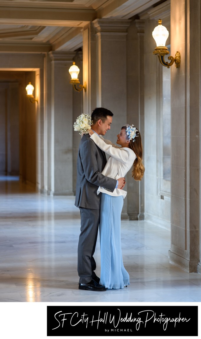 Blue dress bride with her groom at San Francisco city hall - Wedding photography
