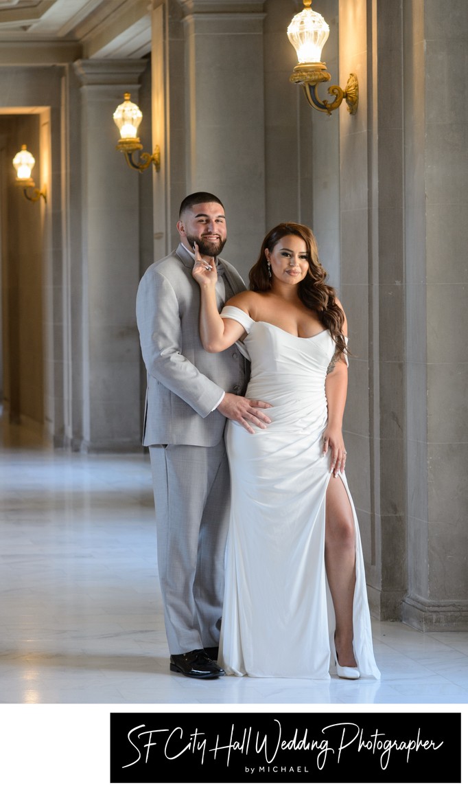Newlyweds posing at city hall - wedding photography image