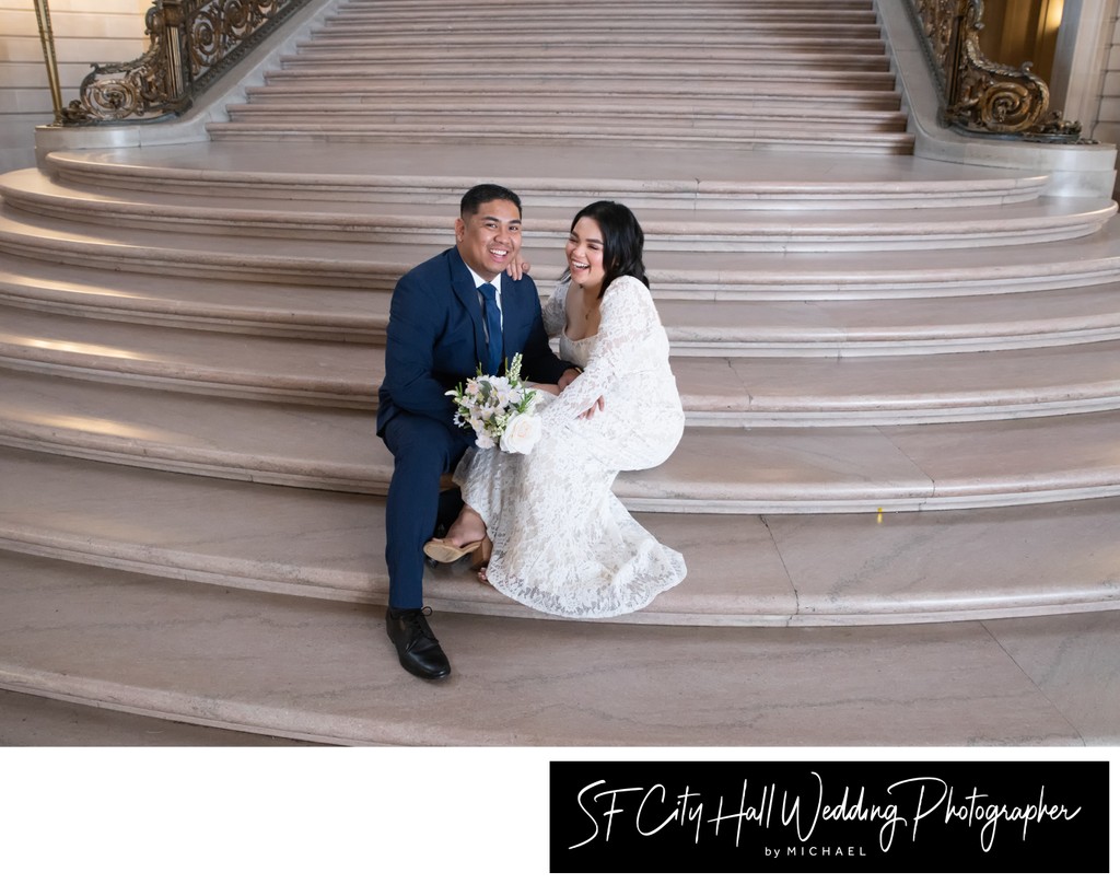 Laughing on the Grand Staircase - wedding photography