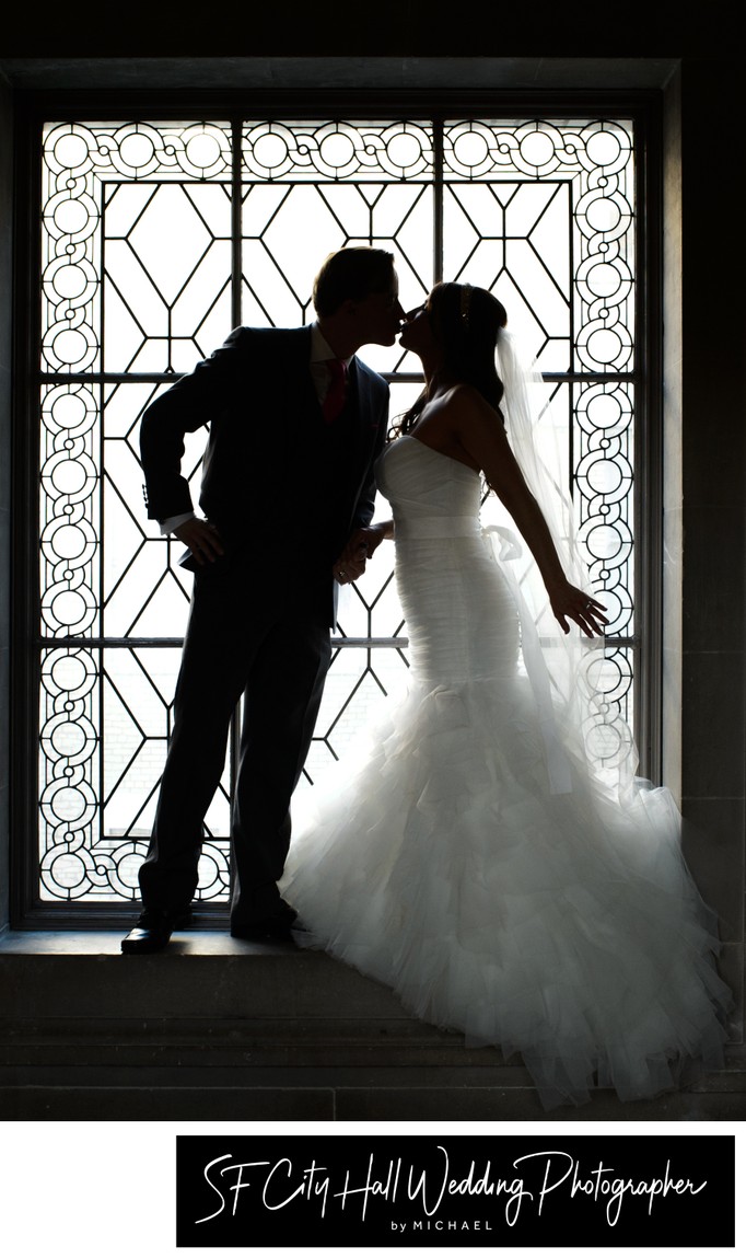 San Francisco city hall wedding photography window image in silhouette
