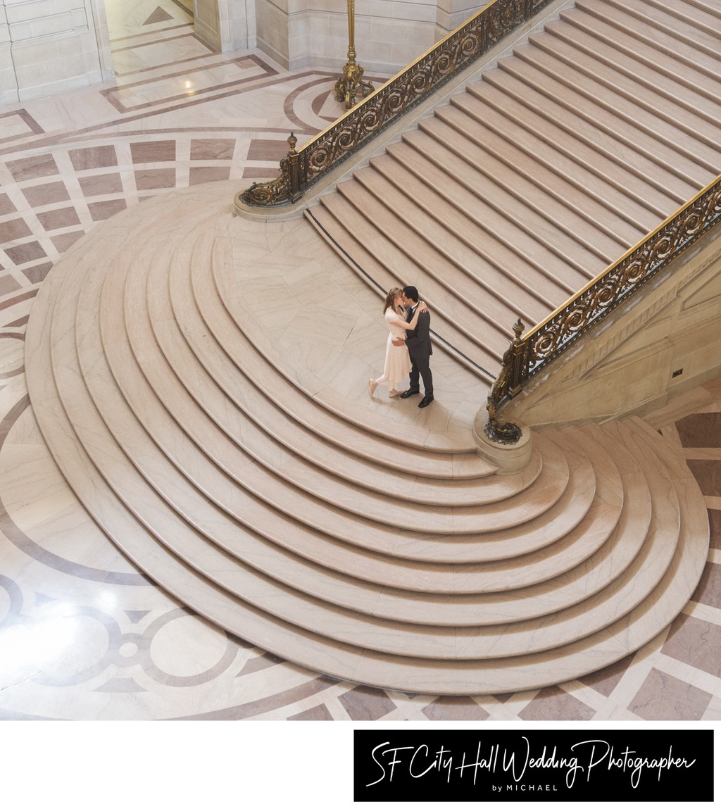 Top Angle view of San Francisco city hall wedding couple on Staircase
