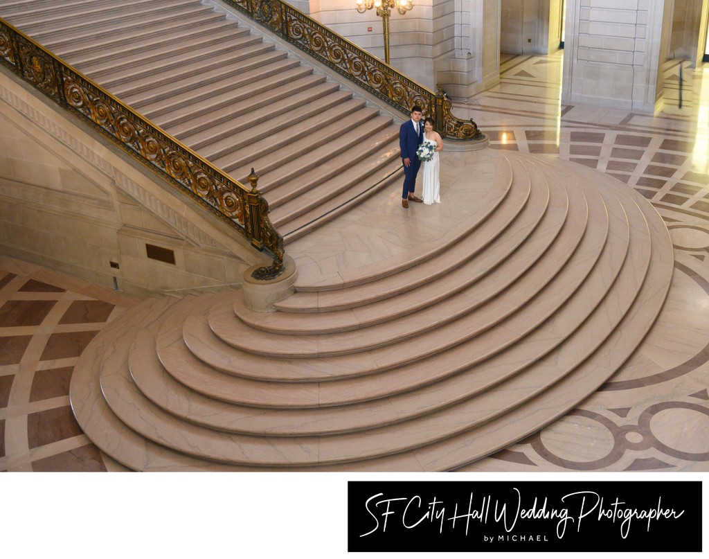 Wedding photographer at the Grand Staircase at SF City Hall