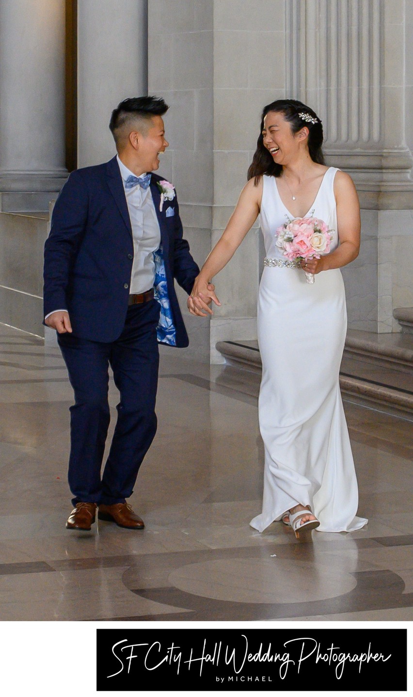 Laughing newlyweds at City Hall