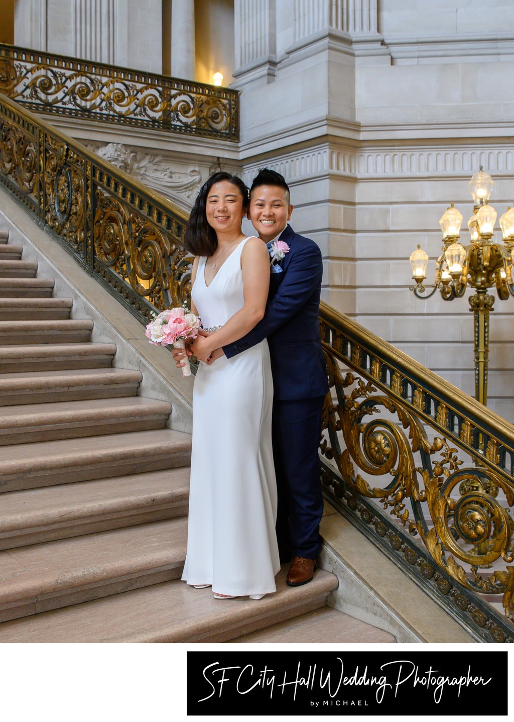 LGBTQ+ couple on the grand staircase