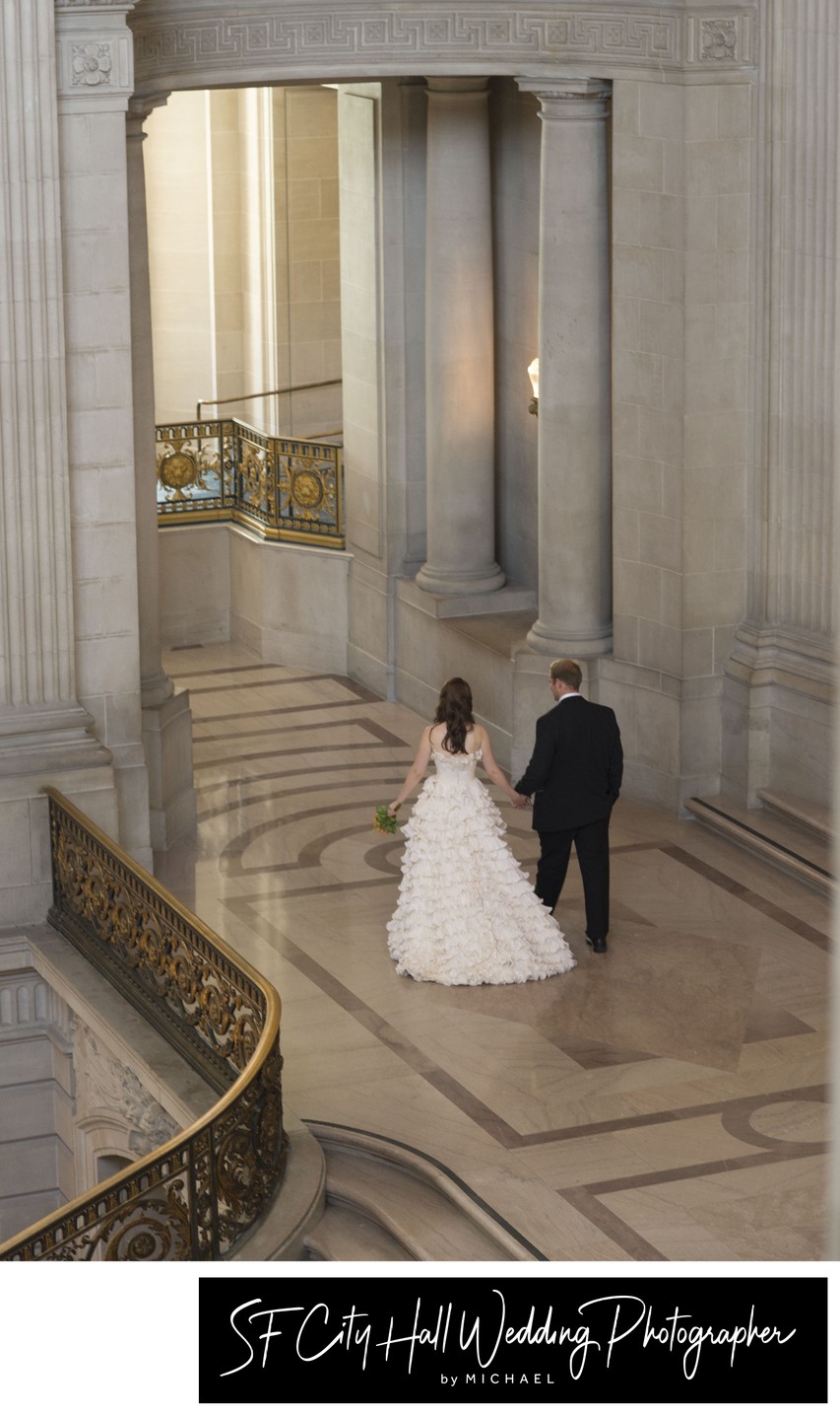 Newlyweds Walk hand in hand at San Francisco city hall