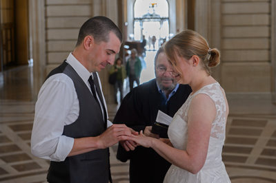 Ring exchange on the Grand Staircase wedding ceremony