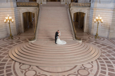 Wide Angle Photo Featuring a City Hall Bride and Groom
