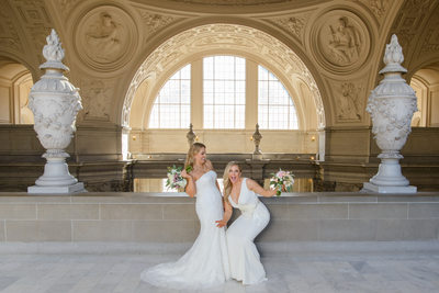 Lesbian brides San Francisco City Hall having fun