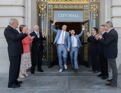 Gay Grooms Having Fun as they leave San Francisco City Hall
