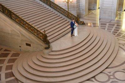 Wedding photographer at the Grand Staircase at SF City Hall